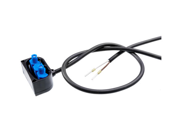 Liitoskaapeli päätykappaleen suuntaan